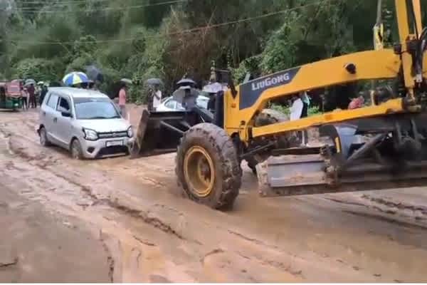 agartala khowai highway paralyzed by torrential rain heavy machinery deployed to move vehicles