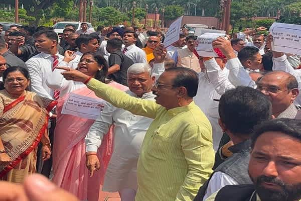 rajya sabha mp rajib bhattacharjee joins parliament protest against congress demonstration