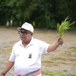 tripura agriculture minister joins farmers in paddy plantation drive at mohanpur