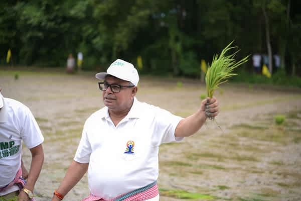 tripura agriculture minister joins farmers in paddy plantation drive at mohanpur