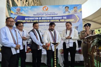 tripura transport minister distributes uniforms to prepaid taxi auto drivers at mbb airport