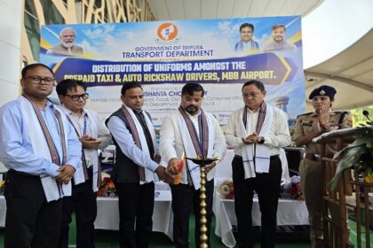 tripura transport minister distributes uniforms to prepaid taxi auto drivers at mbb airport